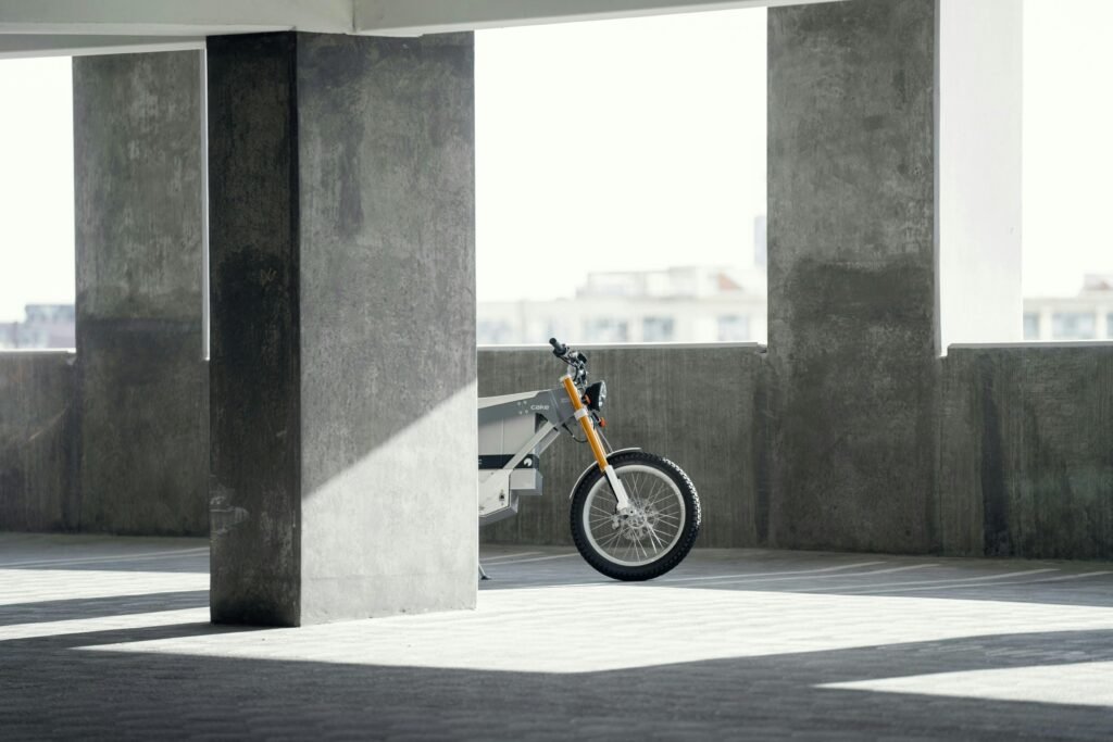 Electric bike behind cement building